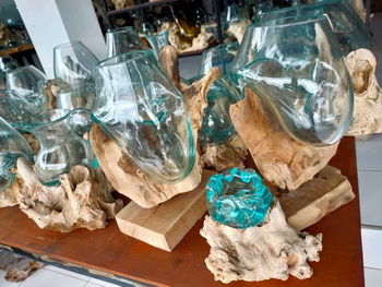 glass bowl on driftwood