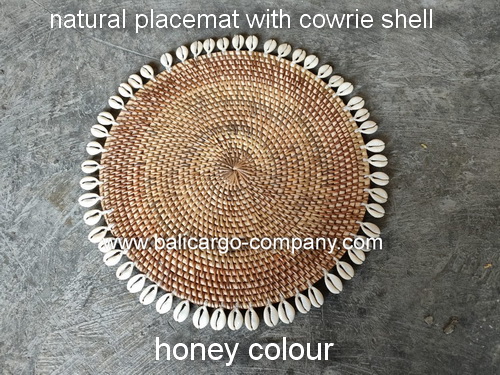 natural placemat with cowrie shell